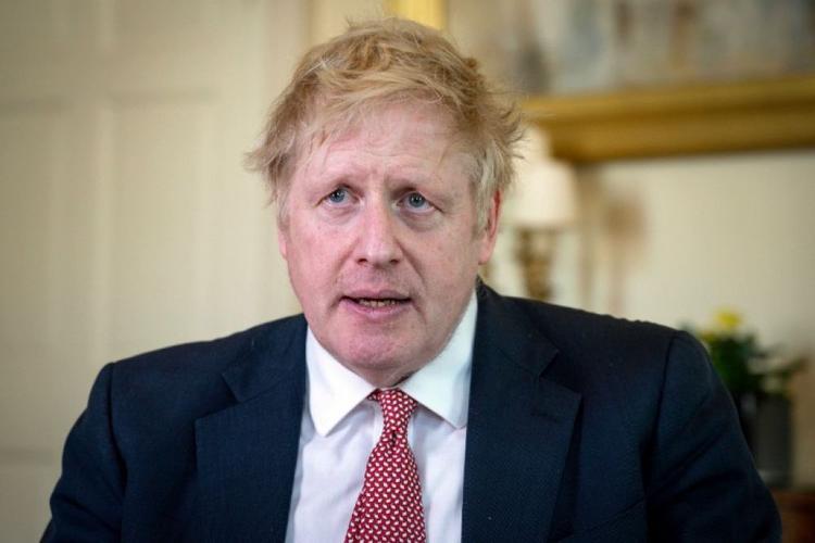英国大选的原因可能是政府面临的一系列内部和外部挑战，如脱欧、经济衰退和社会不满等