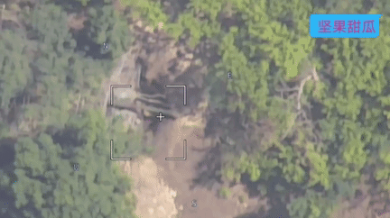 在伊林卡地区，俄军南部集群第238炮兵旅放出一架无人侦察机，在一片田野的放风林发